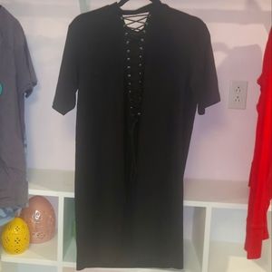 Black dress with short sleeves from the waist up to the collar size medium